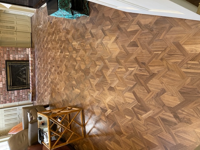 Walnut Mosaic pattern( Heartwood). Natural finished with Bona Mega One An Image